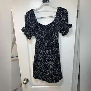 Black polka dot mini dress